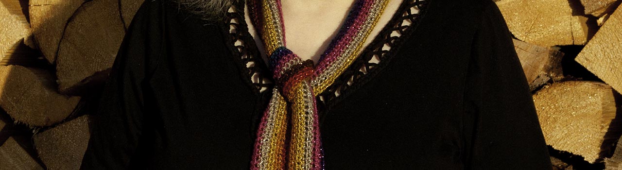 cropped: dark rainbow scarf, black blouse 