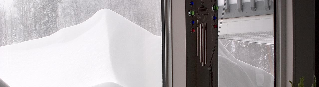 cropped image: huge drift of snow out the window