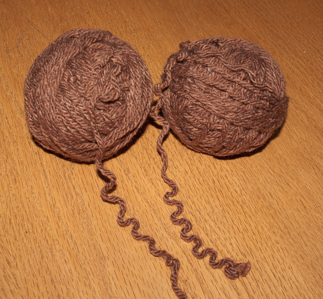 2 balls of crinkly brown yarn