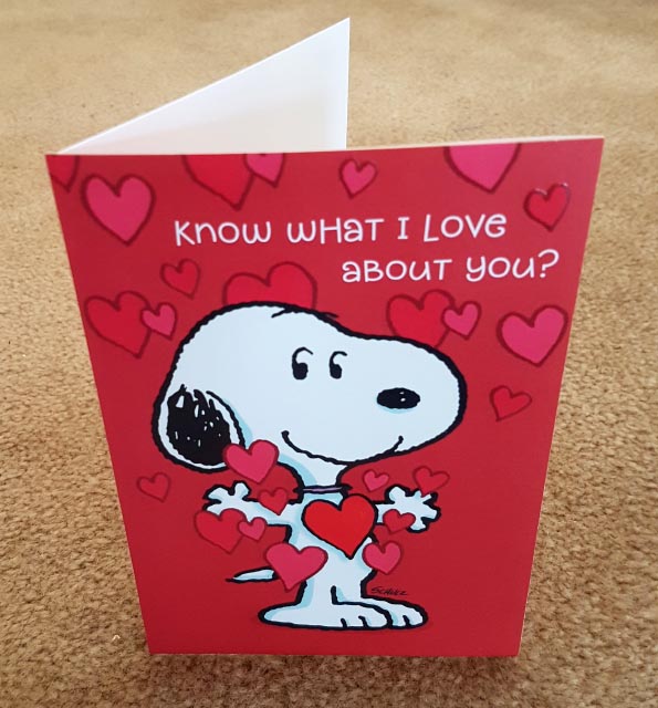 front of red snoopy card with hearts: what do I love about you